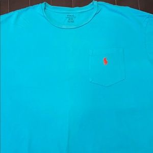 XL Teal in color. Polo short sleeve T shirt.